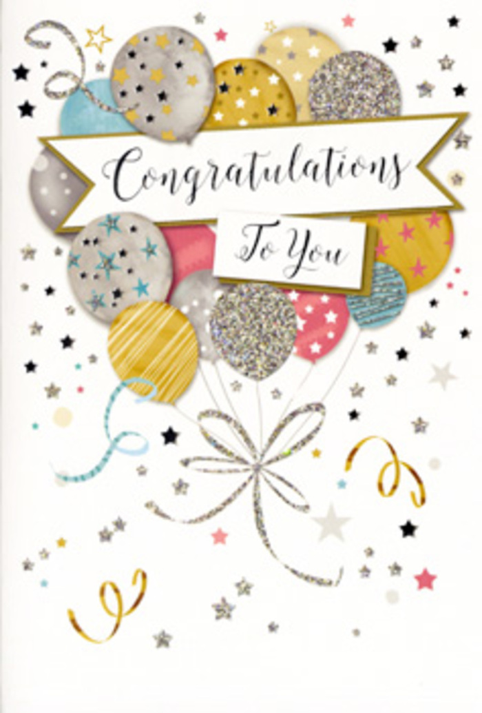 An elegantly designed congratulations card is shown upright, its artwork creating the impression of a sky filled with celebratory balloons drifting above Eastcote's leafy streets. The main focus is a generous cluster of rounded balloons in harmonious tones of soft gold, shimmering silver, champagne beige, pale blue, blush pink, and dove grey. Each balloon is carefully detailed with glimmering stars, fine pinstripes, or subtle glitter textures, giving the design a tactile richness, as if you could almost feel the raised ink when you run a fingertip across the surface. Their slender, curling strings in metallic gold and silver trail downward, gracefully crossing over one another like well-placed stems in a florist's hand-tied arrangement. Around the balloons, a cloud of delicate metallic stars, tiny dots, and spiral ribbons sparkles against a pale, unobtrusive background, capturing the light, playful mood of a celebration dinner after work in nearby Pinner or a family party in Ruislip Manor. Across the centre of the composition, a neatly curved banner seems to float, bearing the message Congratulations To You in stylish, looping script. The lettering adds a sense of ceremony, making the card feel suitable for major milestones-a promotion, a new job, a completed degree, or any personal triumph. The overall atmosphere is one of polished joy: festive without being loud, glamorous yet approachable, much like a tasteful arrangement of white roses and champagne-toned blooms you might order for same-day delivery across Eastcote. It is the kind of card that slips perfectly alongside a bouquet, completing the story of pride, admiration, and heartfelt celebration.